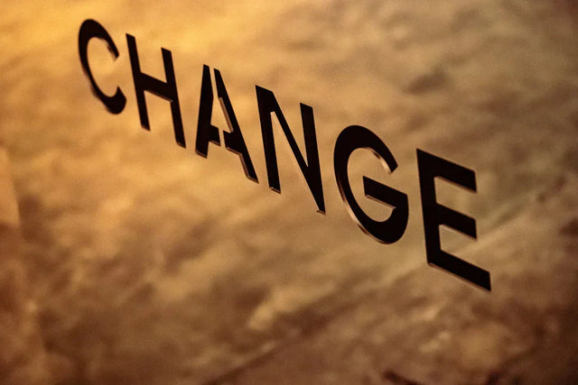 Embracing change: CHANGE in black letters by Avodah Dynamics
