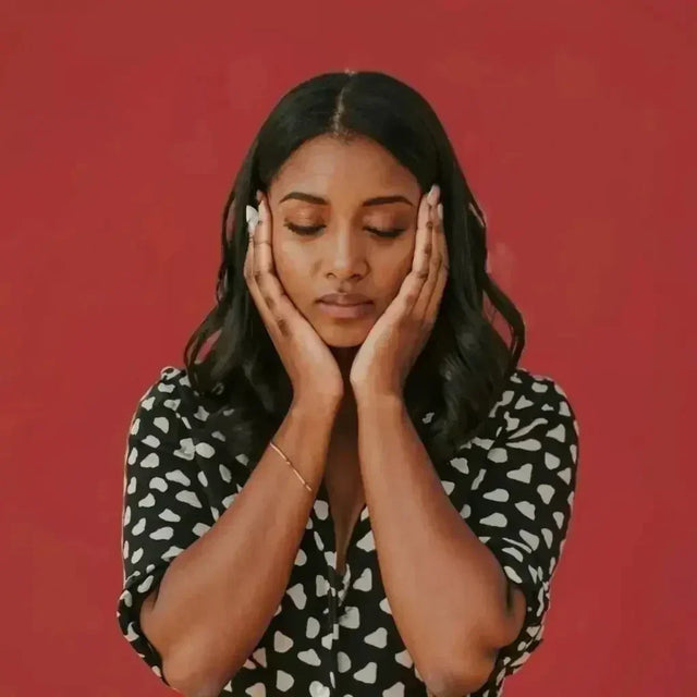 Woman embracing vulnerability to overcome limiting beliefs for personal growth