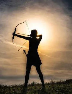 Silhouetted archer aiming bow at sunset, embodying fearless faith