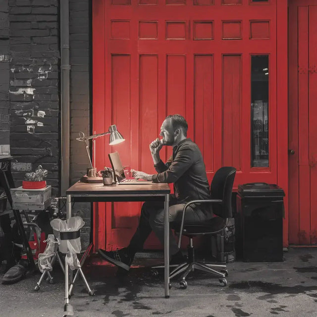 Person practicing mindfulness on mountain top for mental wellness