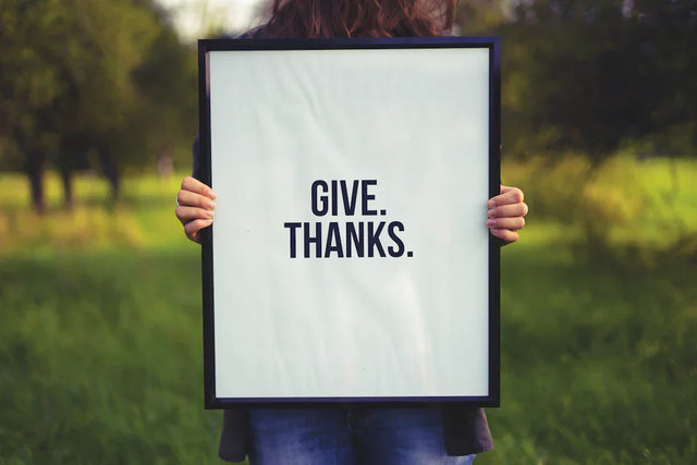 Black framed give thanks sign for personalized communication and loyalty programs