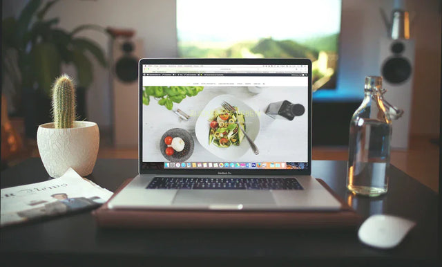 Open laptop showing food photo for boosting brand identity and strong online presence