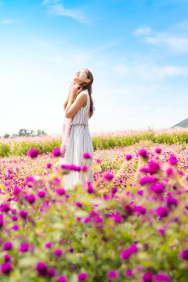 Woman in a flower field representing creating engaging content for business success