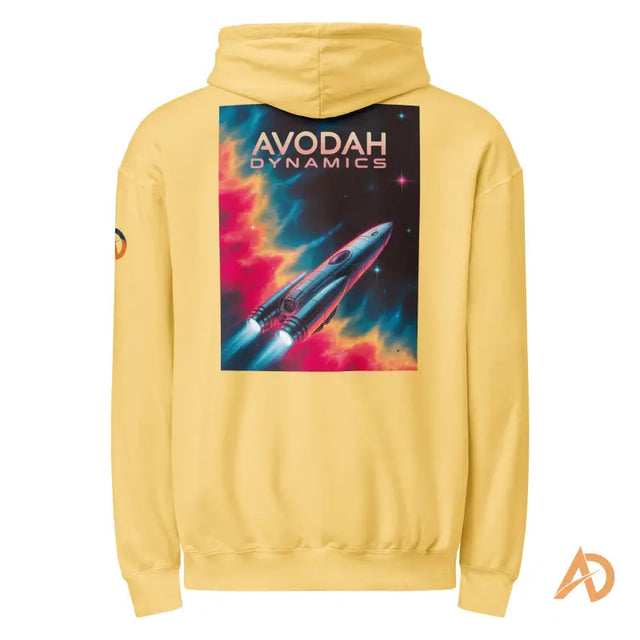 Yellow Avodah Dynamics Hoodie with Rocket in Space, Galaxy EditionYellow hoodie with a futuristic rocket graphic and AVODAH DYNAMICS branding, featuring vibrant cosmic colors.
