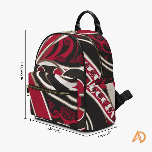 Stylish Geometric Signature Paisley Backpack in red, black, and white swirling pattern