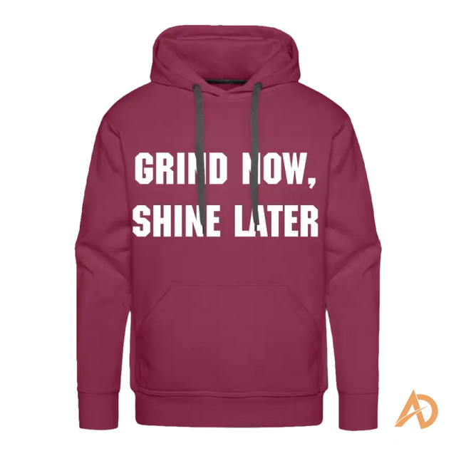 Burgundy hoodie with white text promoting hustle culture and dedication pullover hoodie