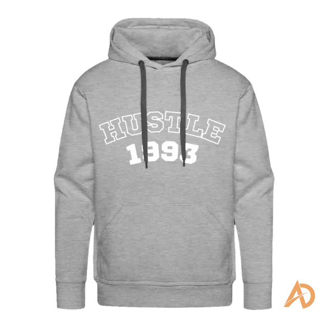 Grey hoodie with HUSTLE 1993 print, embodying hustle culture and timeless spirit