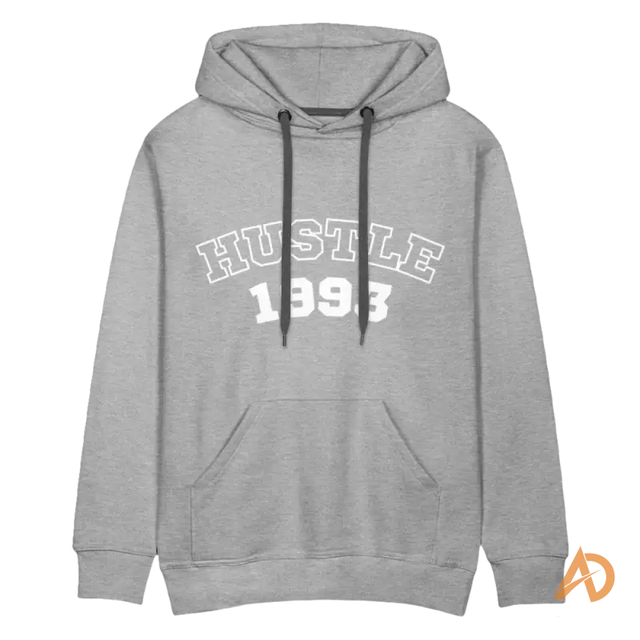Grey hoodie with HUSTLE 1993 text, embodying hoodie vintage vibe and hustle culture