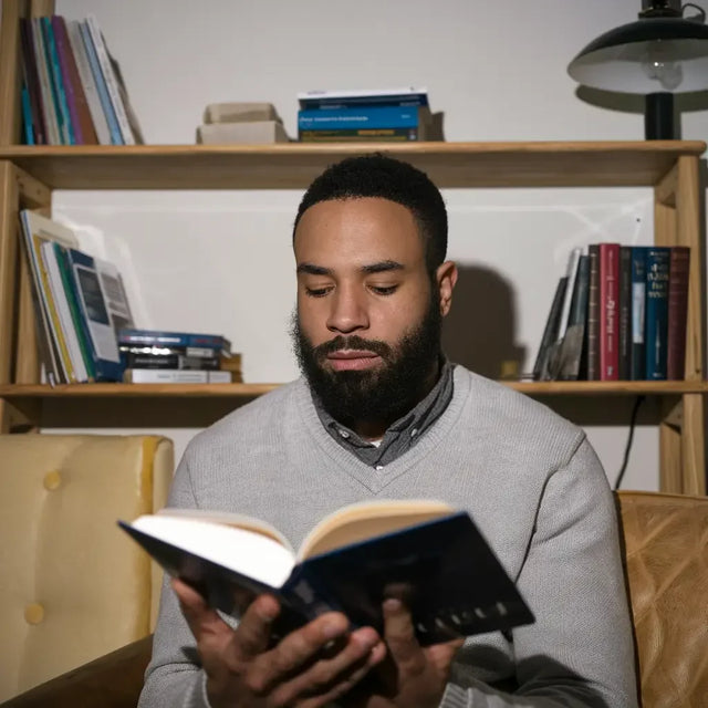 Cultivating effective mindfulness: reading on rocky beach