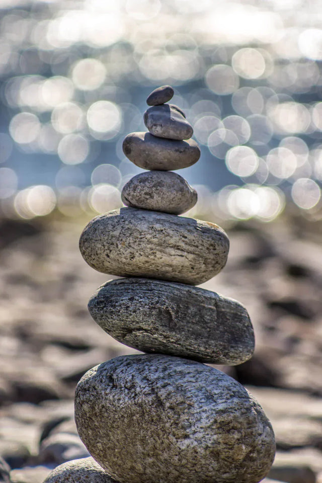 Stacked gray stones symbolizing incorporating mindfulness in effective business planning