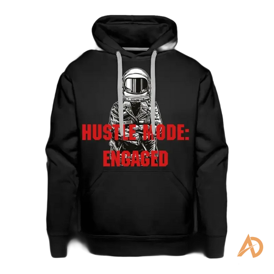 Black premium hoodie with astronaut graphic and Hustle City relentless ambition text