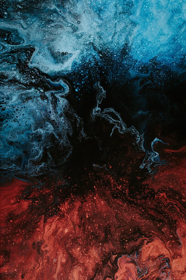Abstract painting of swirling blues, blacks, reds embracing discomfort for growth