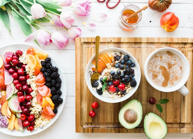 Two colorful breakfast bowls with fresh fruits and granola to boost cognitive function.