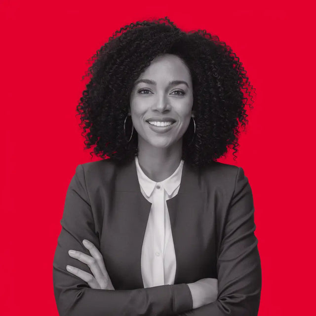 A woman with curly hair in a white shirt exemplifies servant leadership and embracing change.