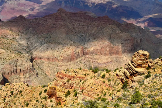 Layered rock formations of the Grand Canyon illustrating understanding habit formation.