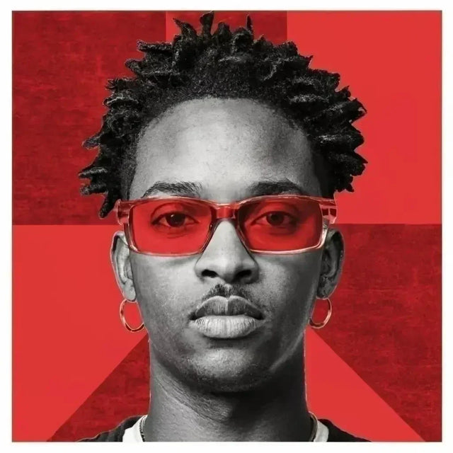 Man with red glasses symbolizes personal growth and self-improvement in hustle culture.