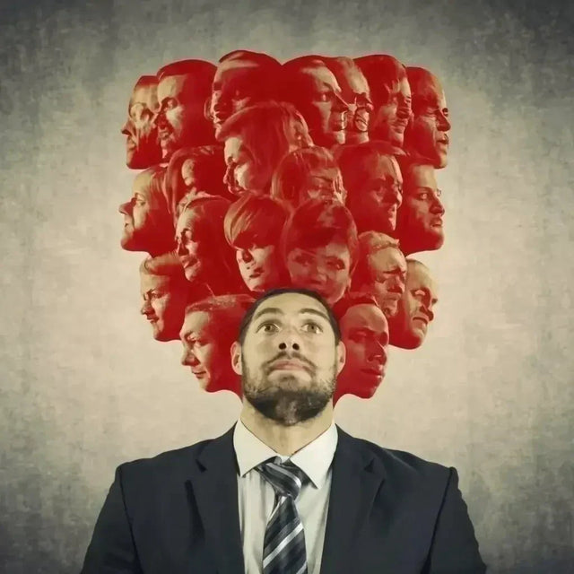 Man balancing multiple heads, symbolizing staying motivated through complex tasks.