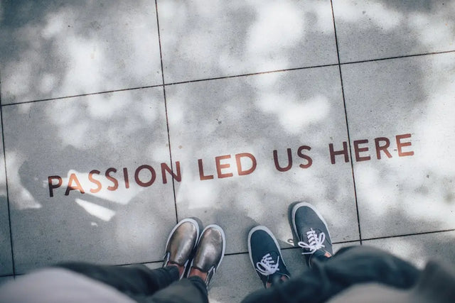 Text reading PASSION LED US HERE above pairs of shoes symbolizing sustainable leadership practices.