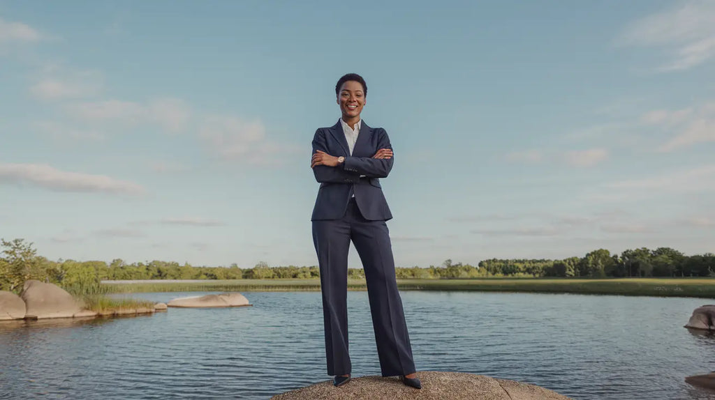 Person in a business suit exemplifying hustle culture with a balanced approach to success.