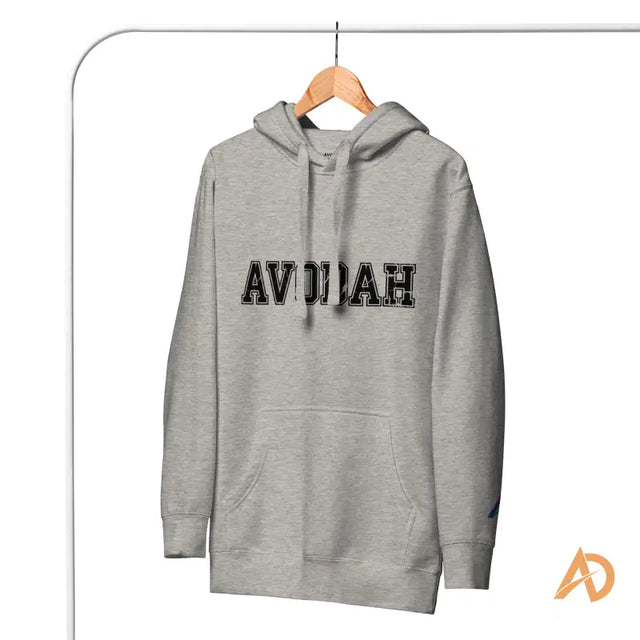 Gray Avodah Varsity Hoodie with avodah text designLight grey AVODIAH hoodie with kangaroo pocket and drawstring hood on wooden hanger.