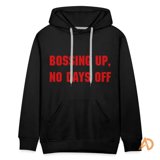 Premium hoodie in black featuring bold red text promoting hustle culture and contemporary design