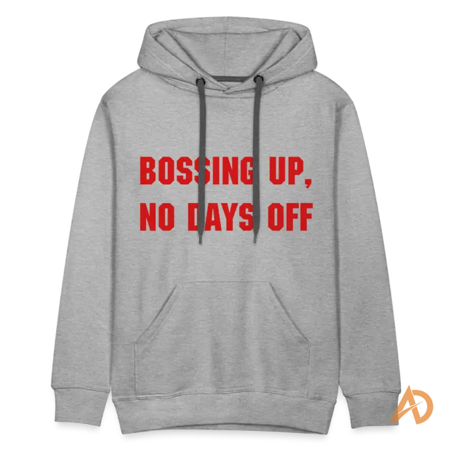 Grey premium hoodie featuring red text Bossing Up, No Days Off, embodying hustle culture