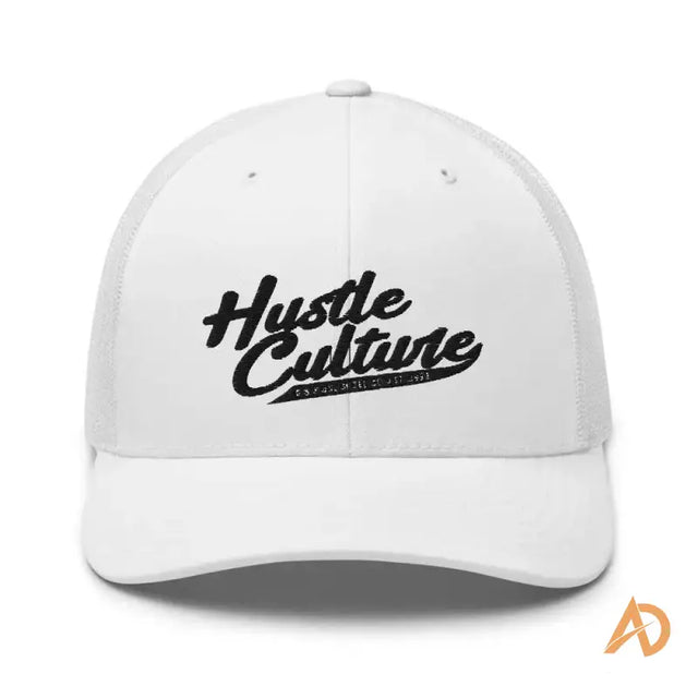 The Hut logo on a white Classic Hustle Culture Trucker Cap for stylish streetwear