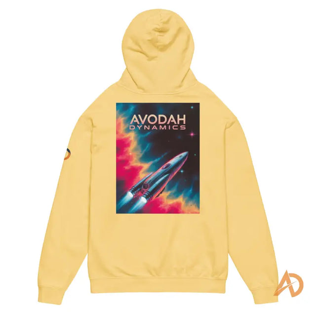 Yellow Avodah Dynamics Hoodie with Spaceship Graphic, Galaxy EditionYellow hoodie featuring a retro rocket launch and 'AVODAH DYNAMICS' text, ideal for inspirational leadership fashion.