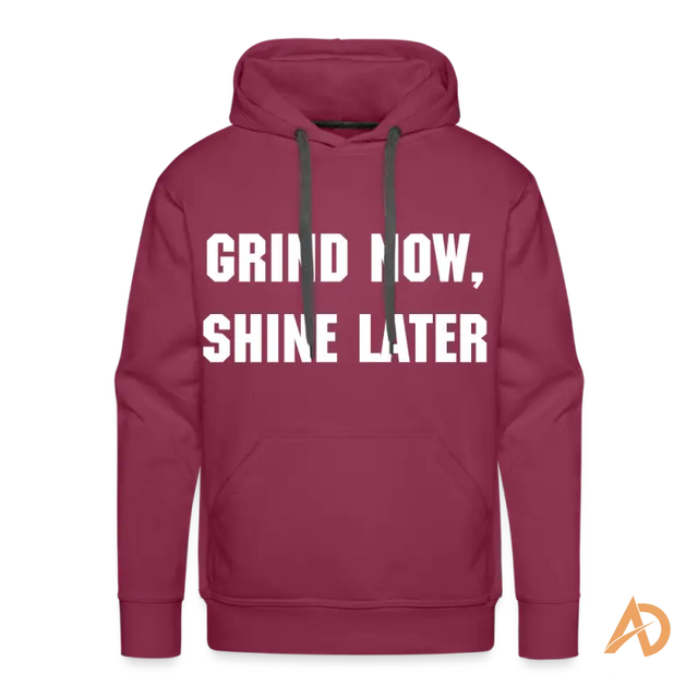 Burgundy hoodie with white text promoting hustle culture and dedication pullover hoodie