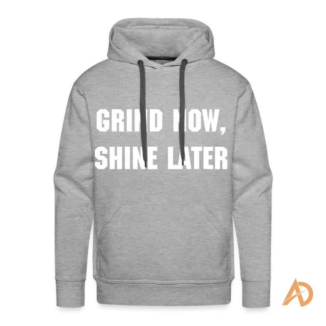 Grey dedication pullover hoodie with white text GRIND NOW, SHINE LATER for hustle culture