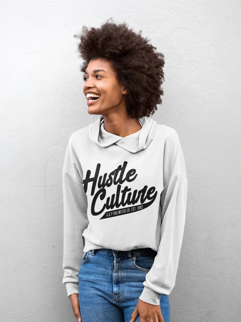 White sweatshirt with Hustle Culture text styled with collared shirt and blue jeans.