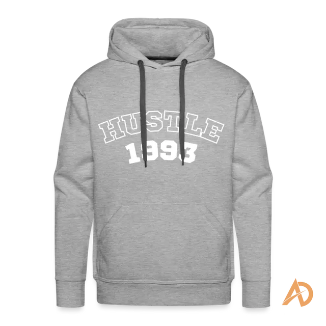 Grey hoodie with HUSTLE 1993 print, embodying hustle culture and timeless spirit