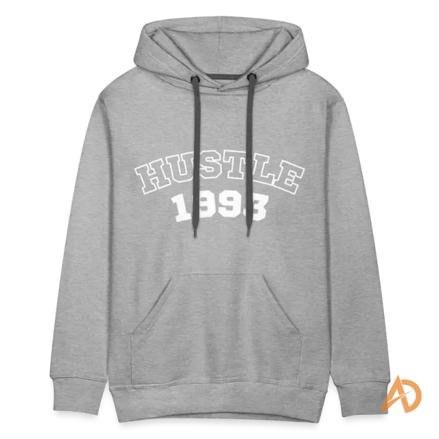 Grey hoodie with HUSTLE 1993 text, embodying hoodie vintage vibe and hustle culture