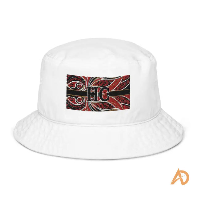 White organic cotton bucket hat with red and black patterned HC patch for Hustle Culture