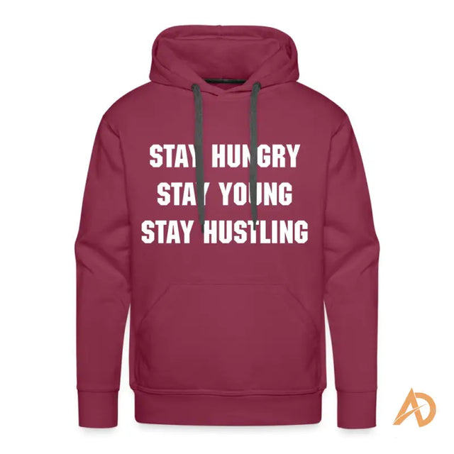 Red persistence hoodie by Hustle Culture featuring Stay Hungry slogan for a youthful vibe