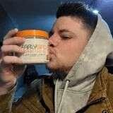 Orange and white jar with black lid for perfect morning routine by Avodah Dynamics