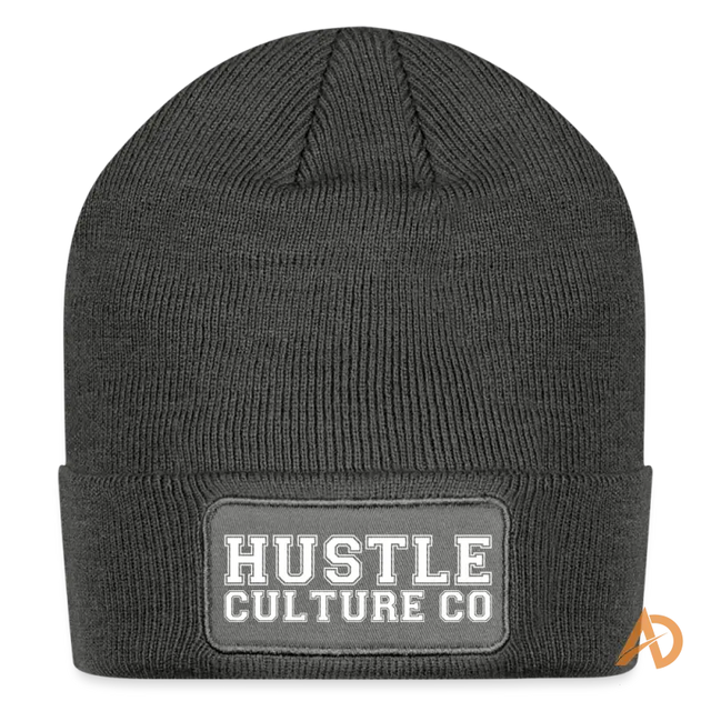 Black knit Varsity Patch Beanie featuring a Hustle Culture Co patch, a stylish accessory